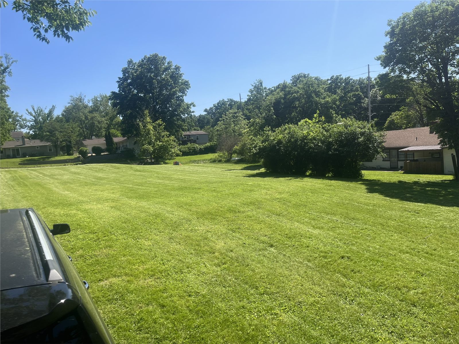 Freshly mowed residential lawn after JDV property maintenance